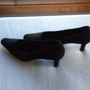 Black cloth heels. Never worn.21/2 inch heels.